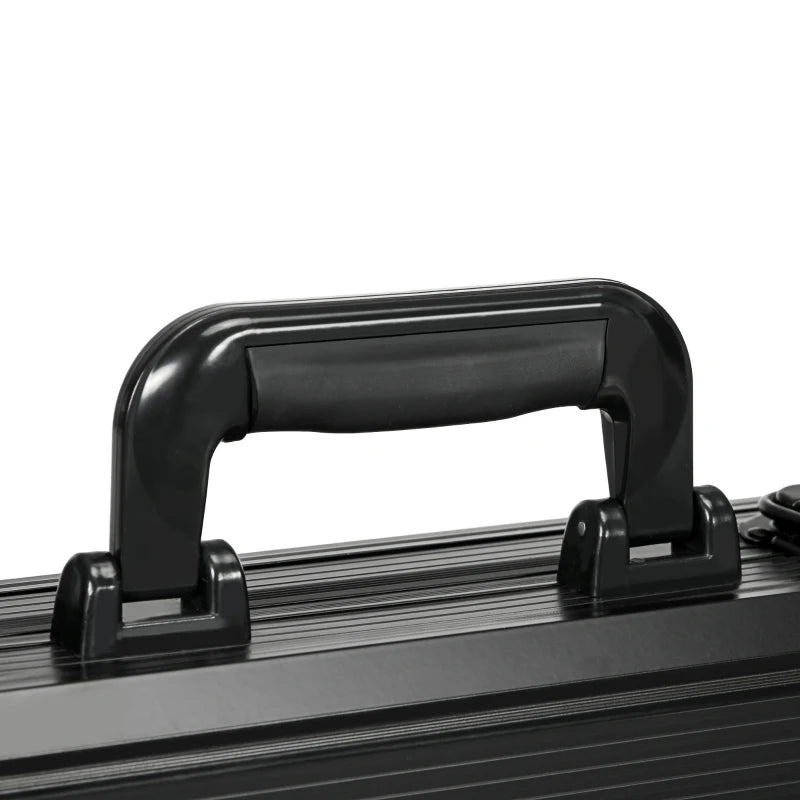 Close-up of a black suitcase handle on a white background