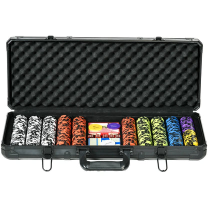 Black poker chip case with assorted poker chips inside on a white background