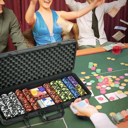 Open case of poker chips with a casino table and players in the background